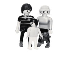 image of playmobil toys of two adults, a kiddo and a teddy bear