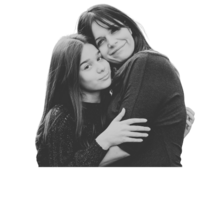 a parent and a young teen in a supportive hug